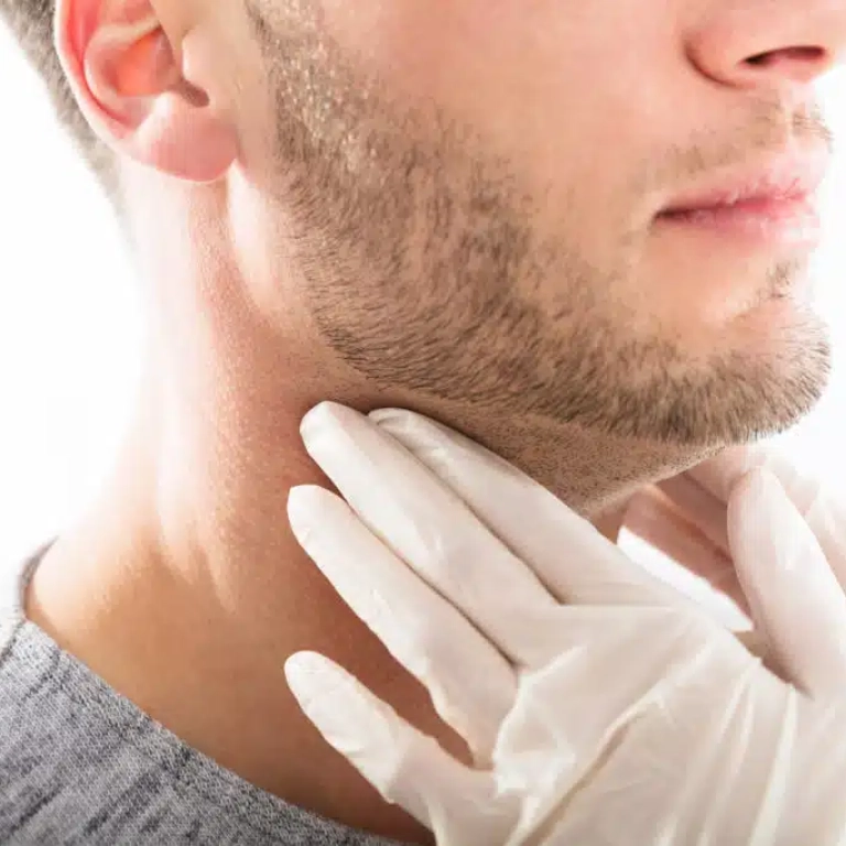 Thyroid-doctor-performing-a-physical-exam-palpation-of-male-thyroid-gland-1024x683.jpg