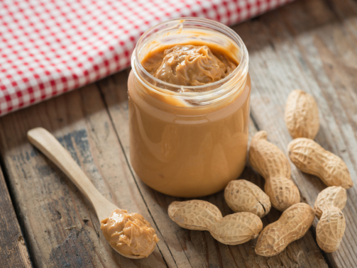 peanut butter surrounded by peanuts