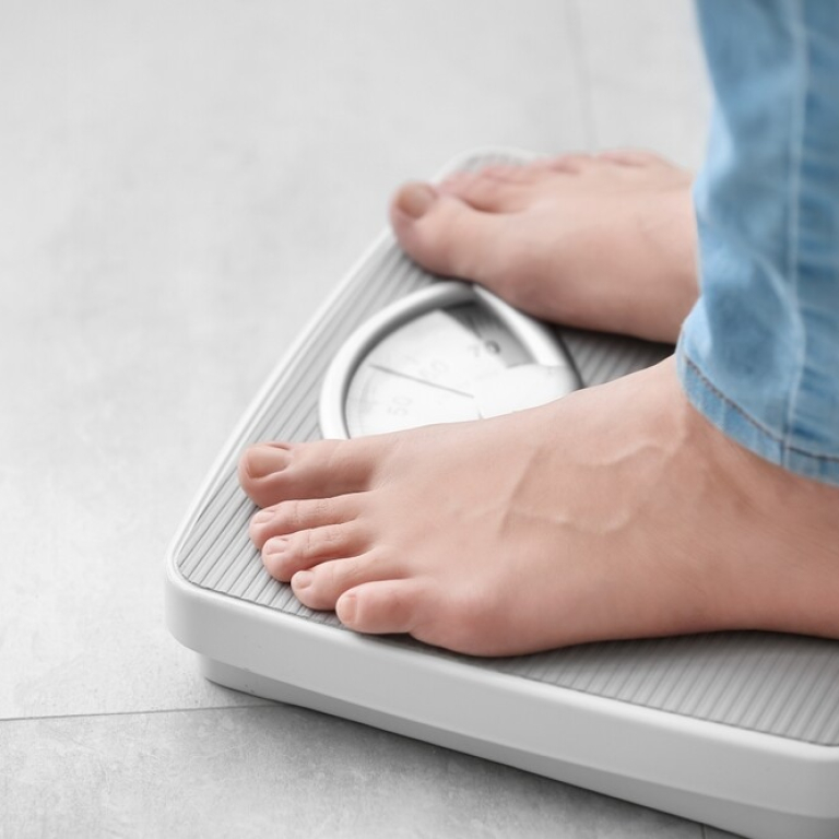 feet on a home scale