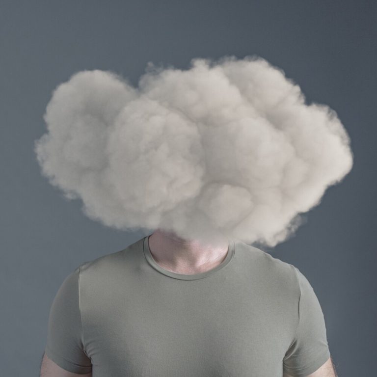 man with fog over head