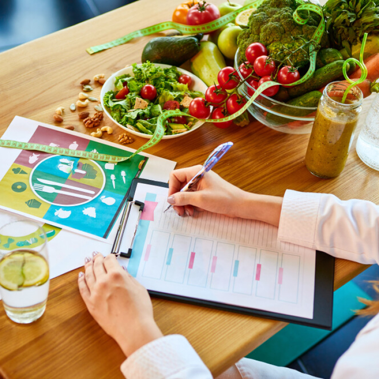 nutritious food on desk with notepad