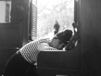 woman with head in hand