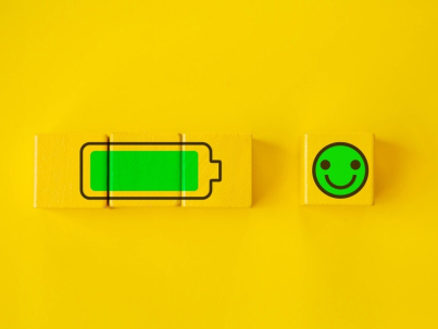 charged battery and smiley face