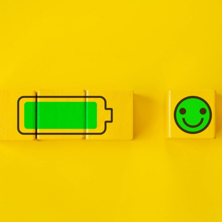 charged battery and smiley face