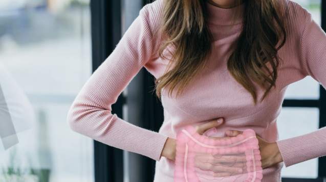 magnifying glass and stomach