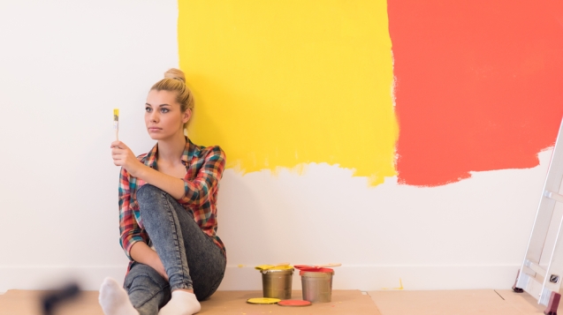Woman choosing paint