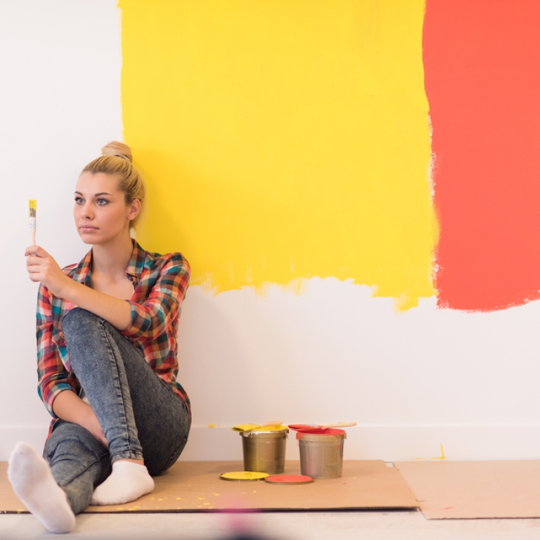 Woman choosing paint