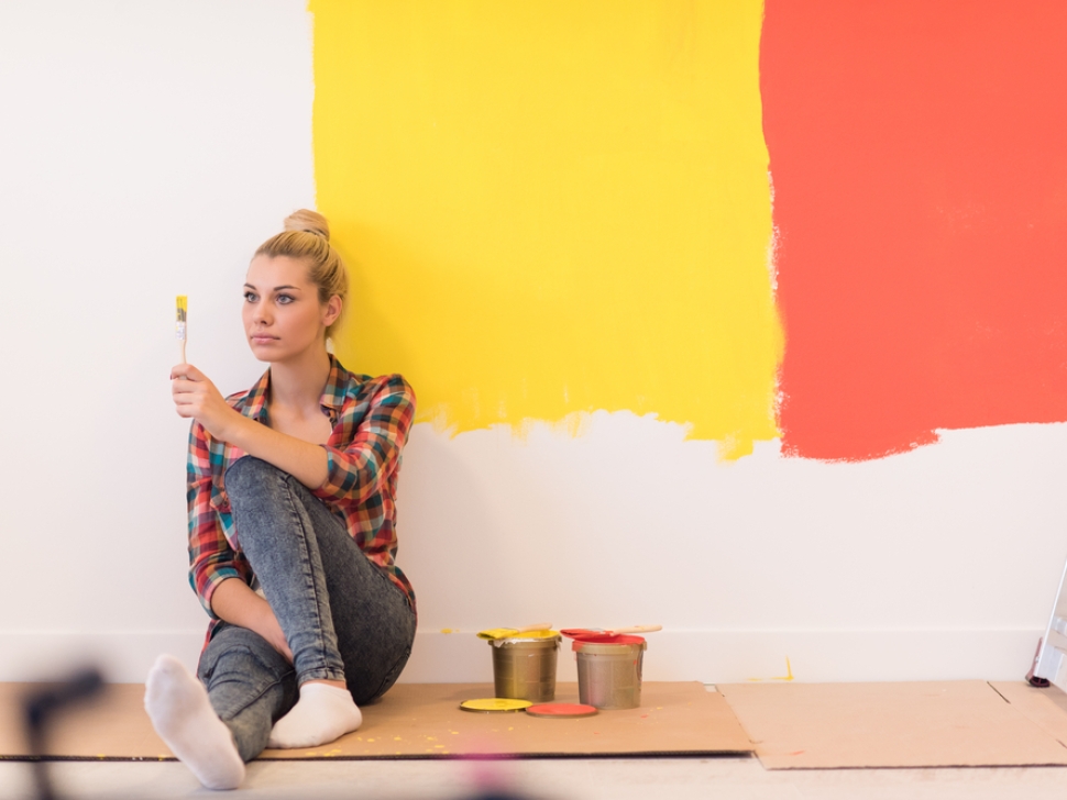 Woman choosing paint